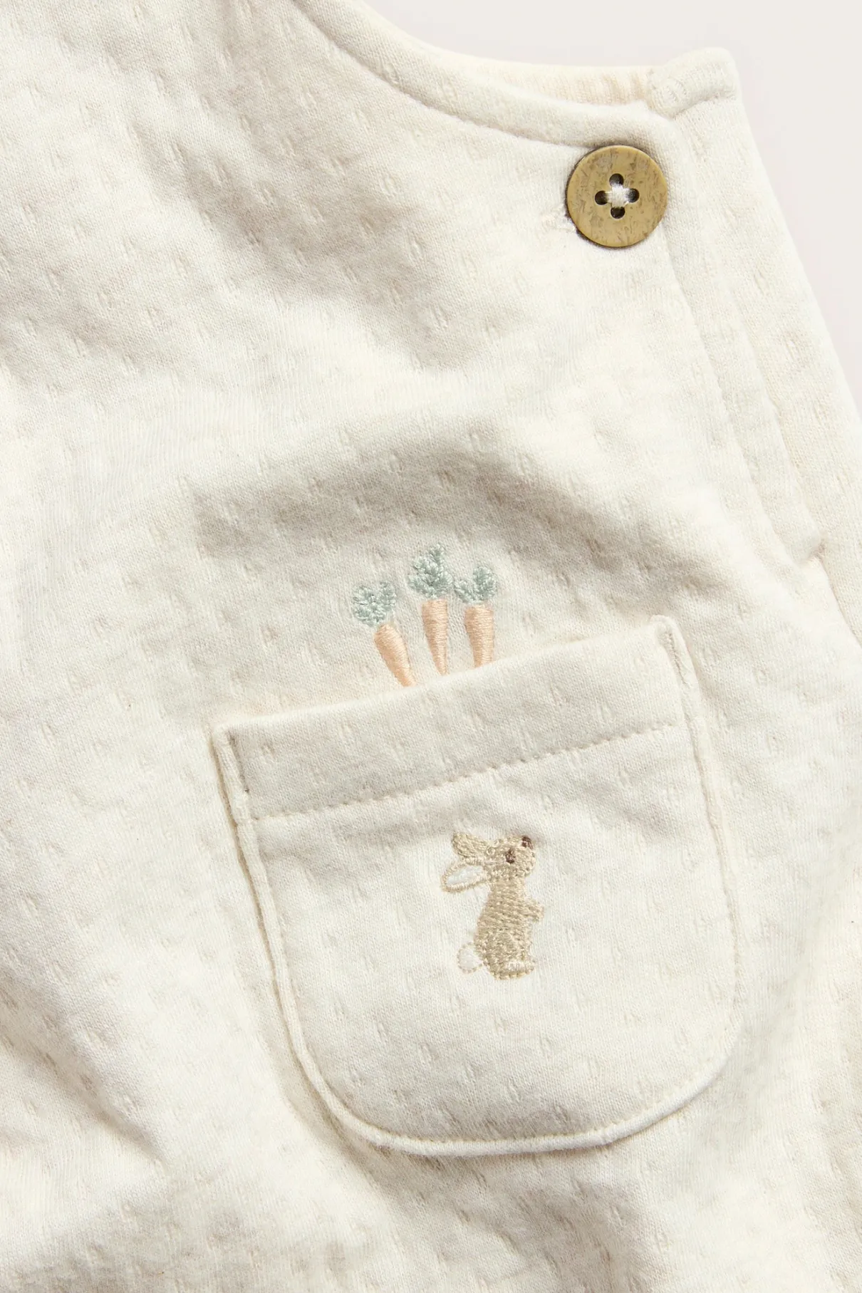 Baby beige jersey dungarees with front pocket