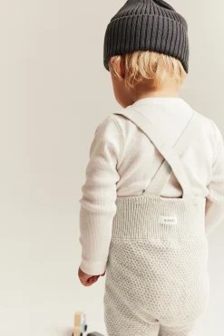 Baby beige knitted dungarees