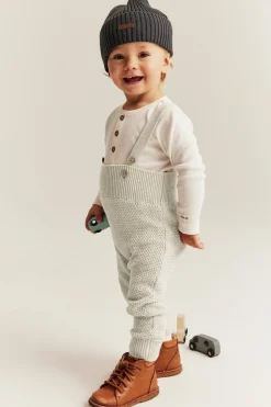 Baby beige knitted dungarees