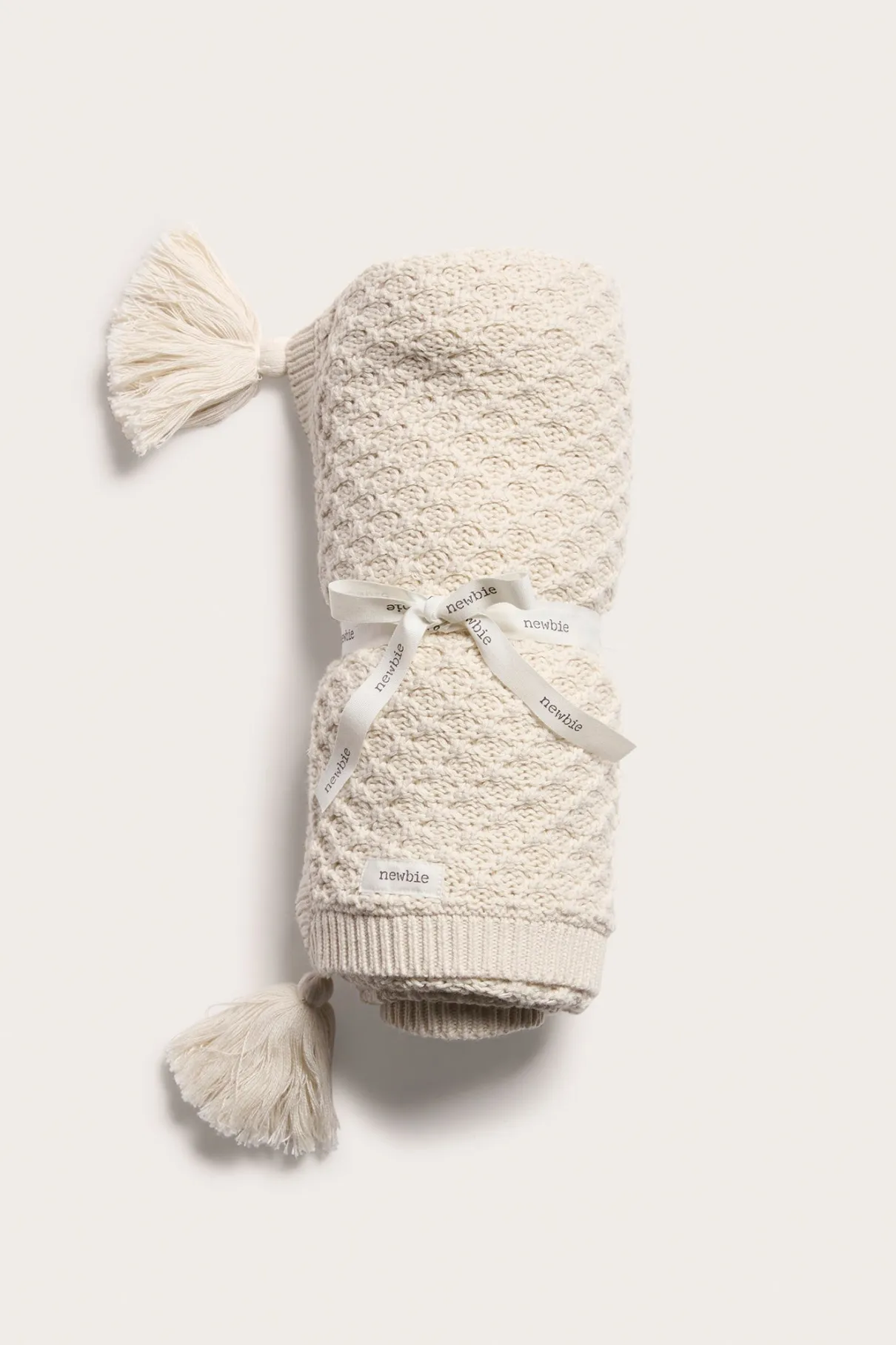 Baby beige knitted pattern blanket