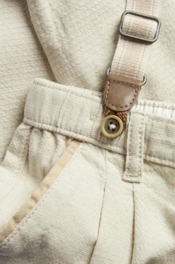 Baby beige woven trousers with suspenders