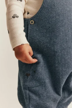 Baby blue dungarees in herringbone