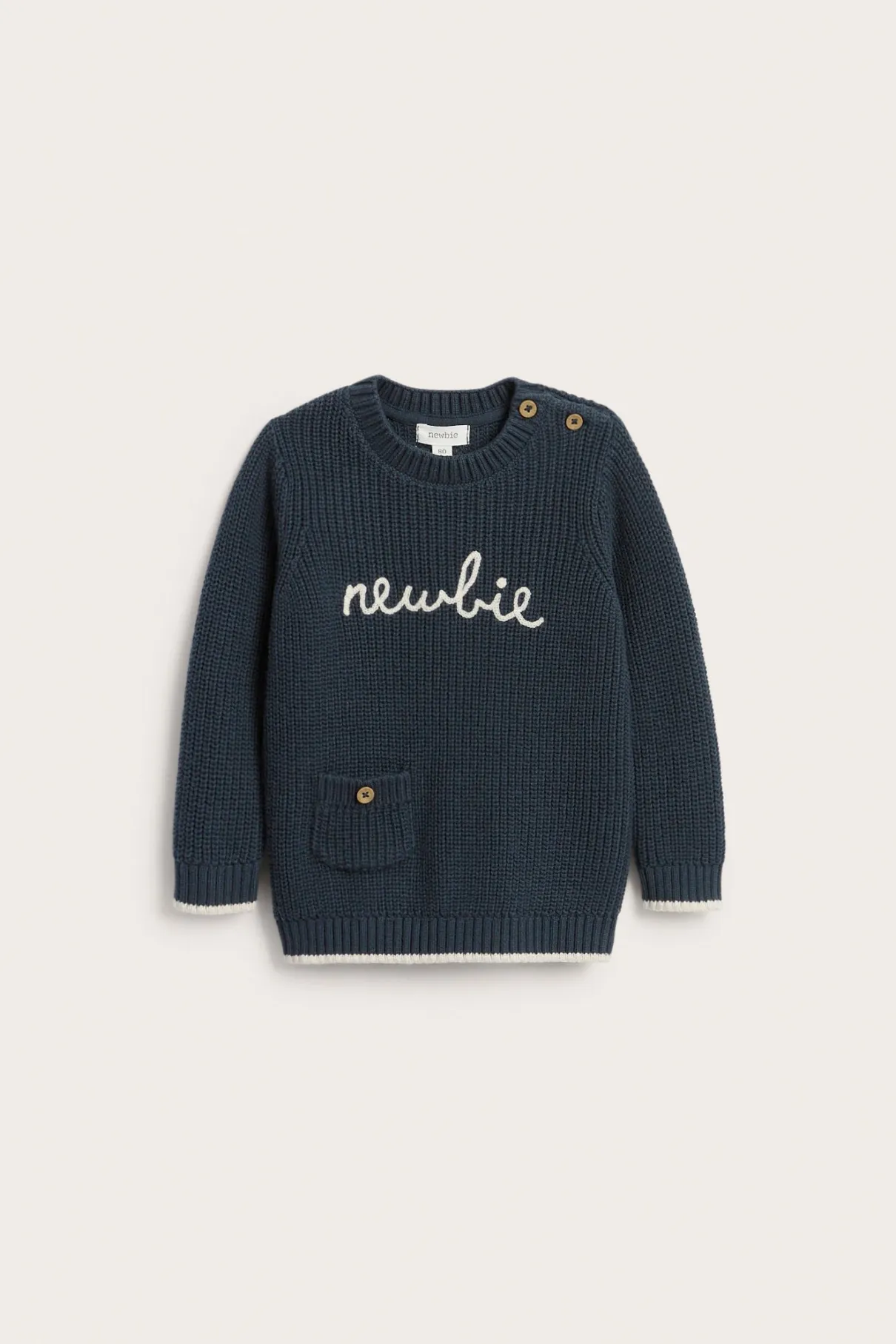 Baby blue knitted jumper with Newbie logo