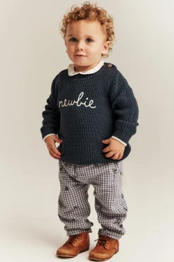 Baby blue knitted jumper with Newbie logo