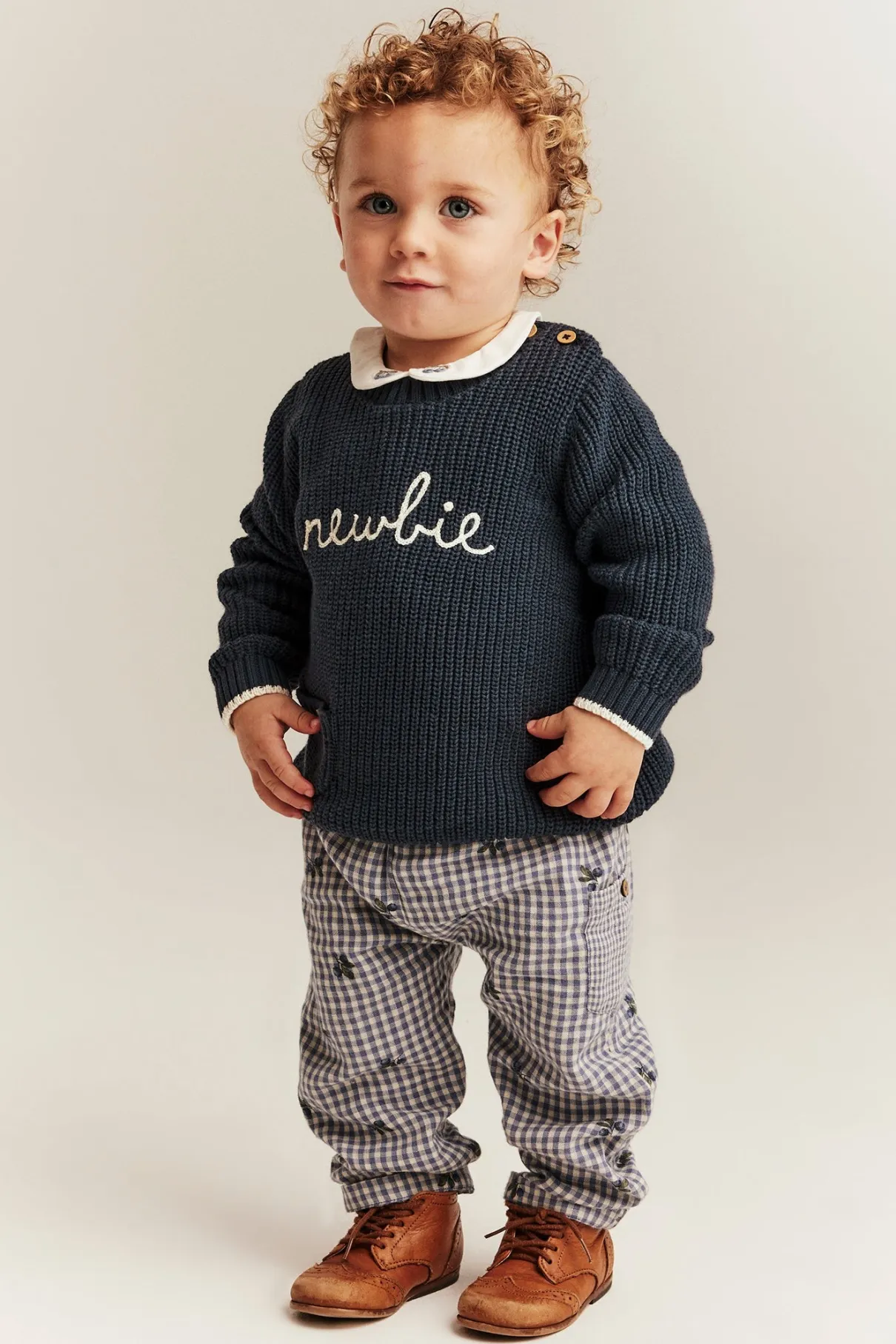 Baby blue knitted jumper with Newbie logo