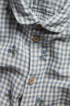 Baby blue shirt bodysuit with blueberries