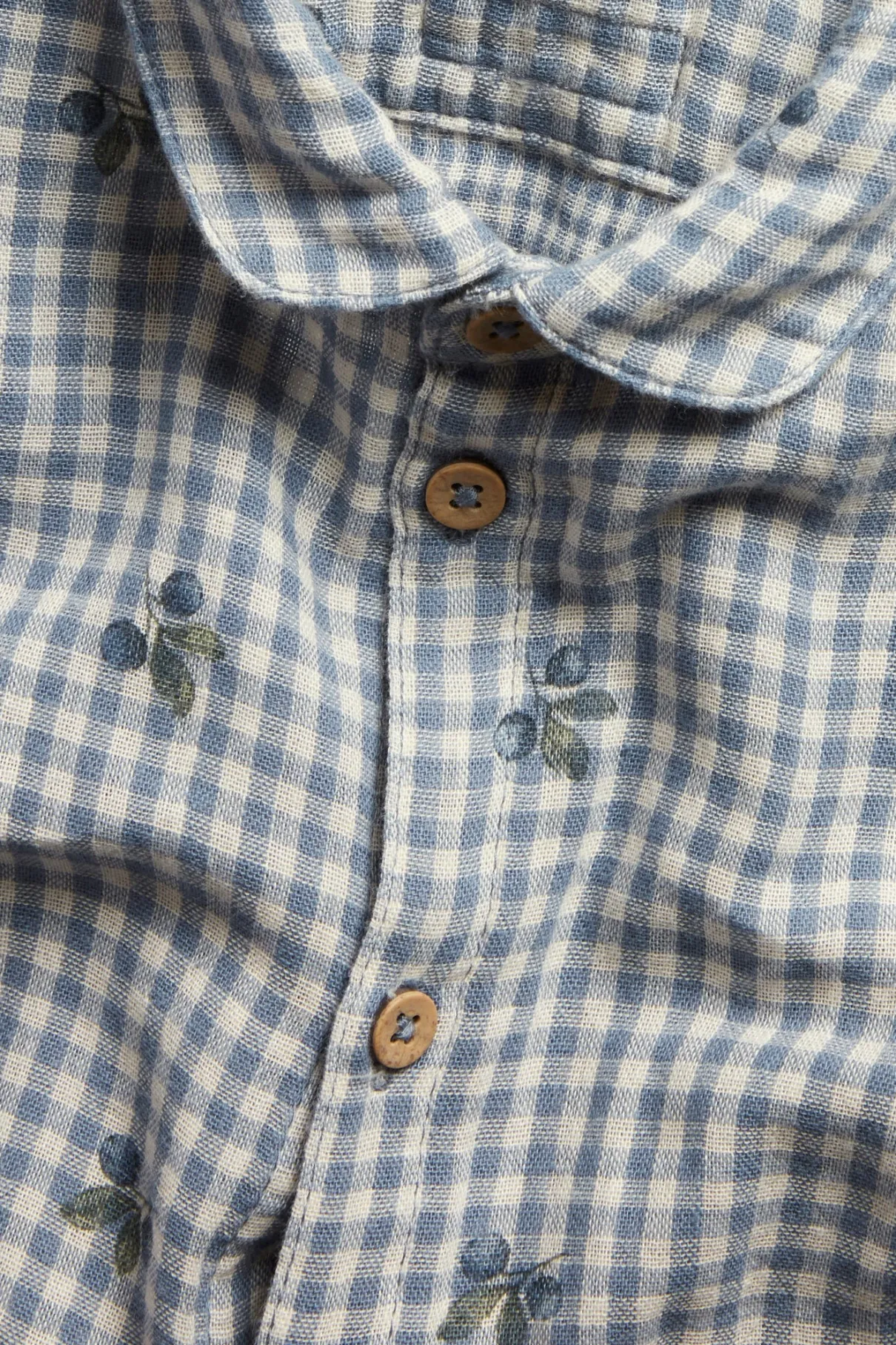 Baby blue shirt bodysuit with blueberries