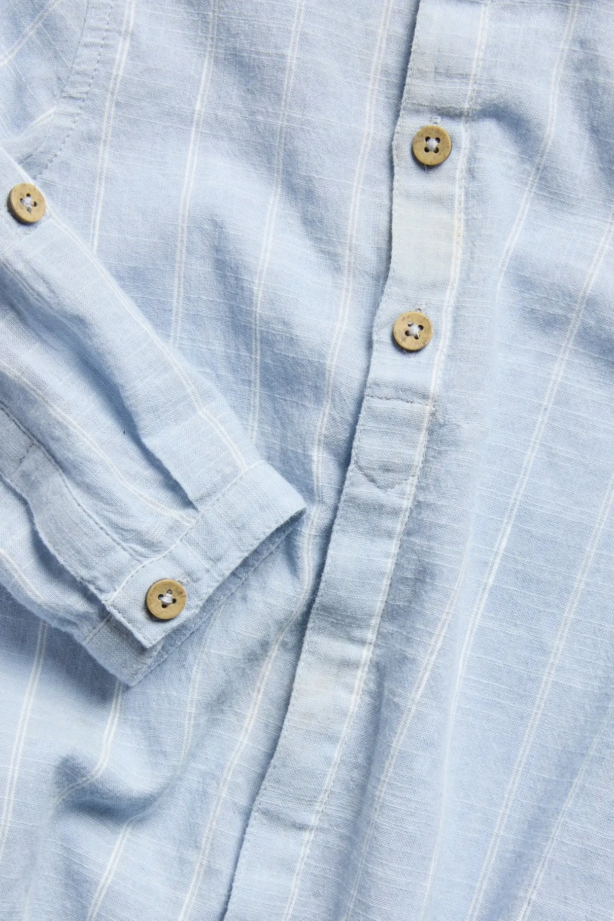 Baby blue striped shirt‑style bodysuit