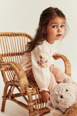 Baby bodysuit with floral embroidery