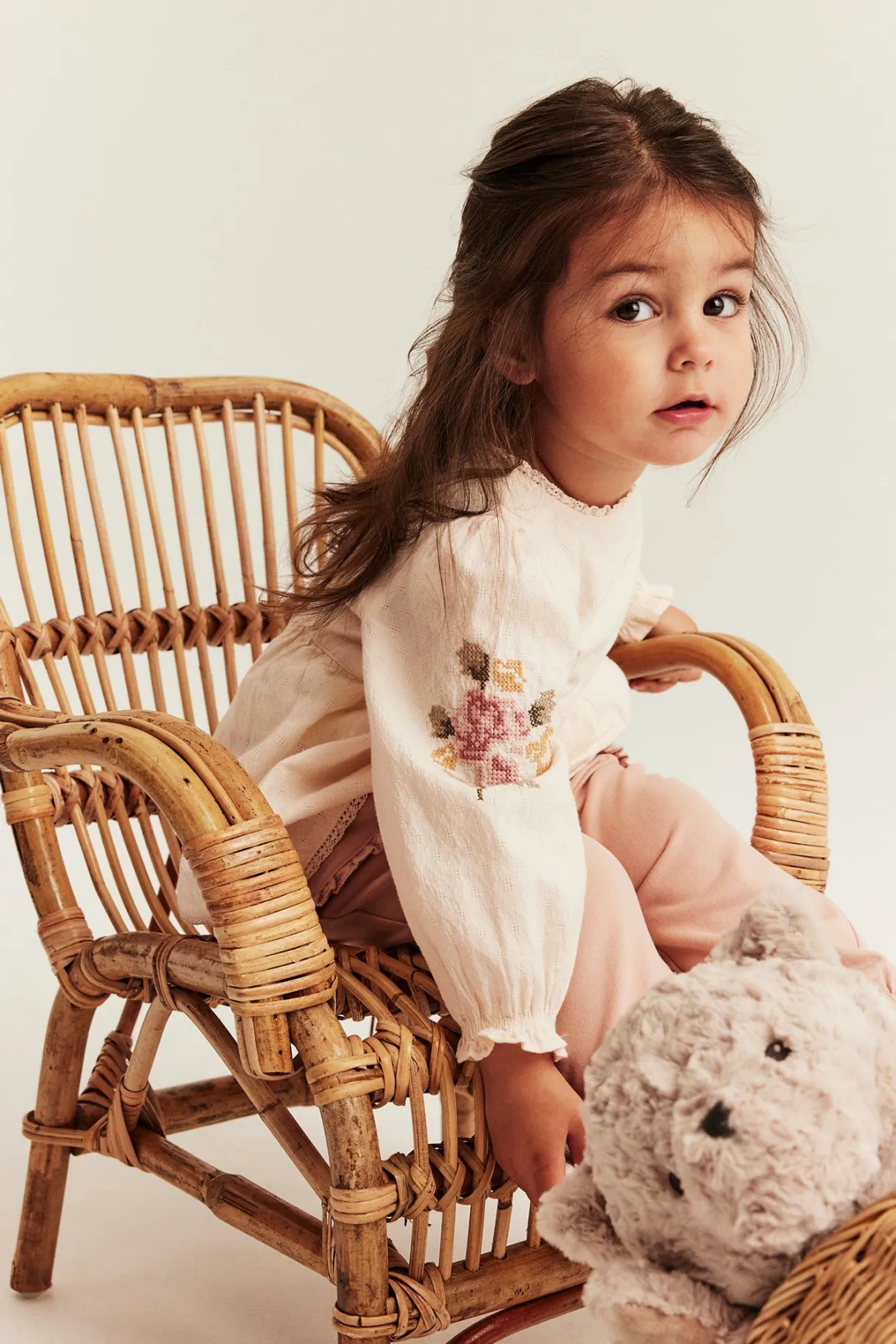 Baby bodysuit with floral embroidery