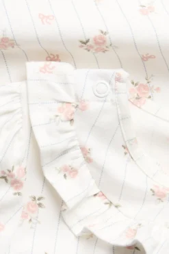 Baby floral pyjamas with frills