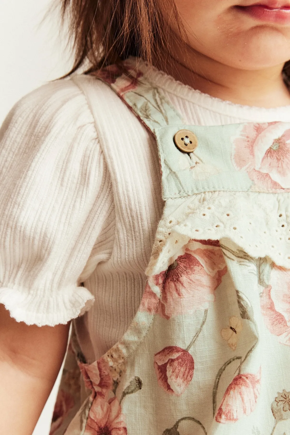 Baby green floral dungarees