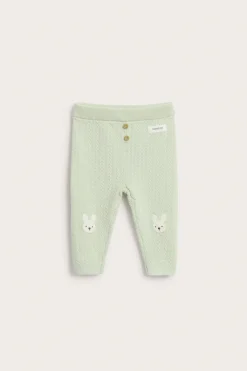 Baby green knitted leggings with rabbit appliqué