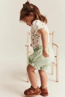 Baby green puff shorts with frill