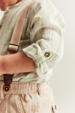 Baby green striped shirt‑style bodysuit
