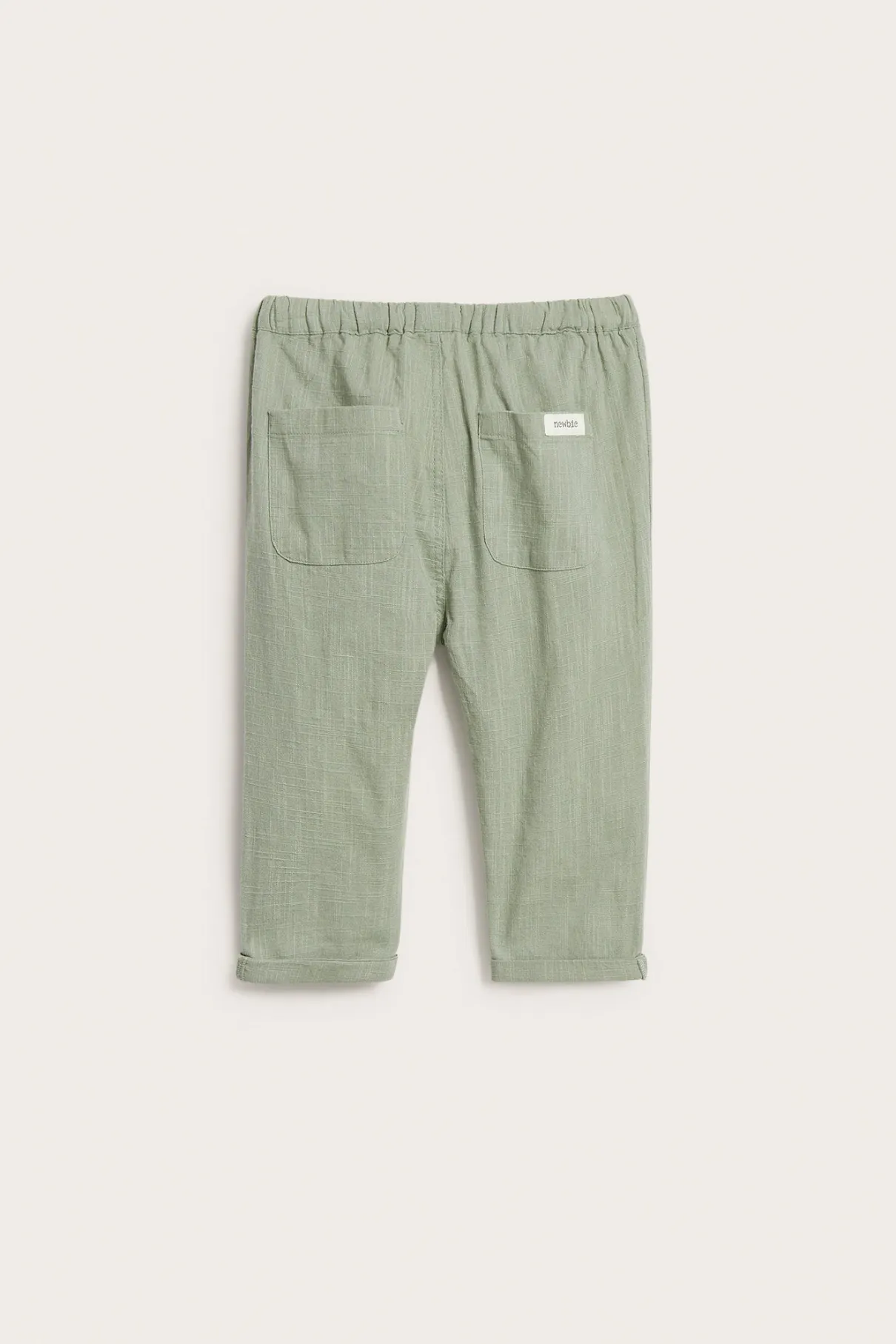 Baby green textured woven trousers