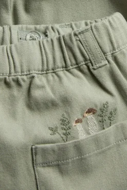 Baby green trousers with embroidery