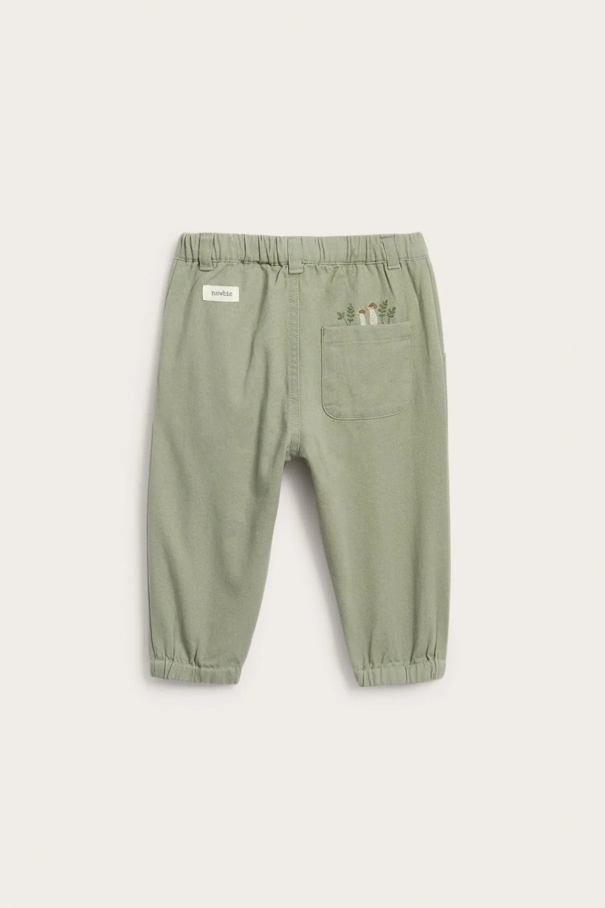 Baby green trousers with embroidery