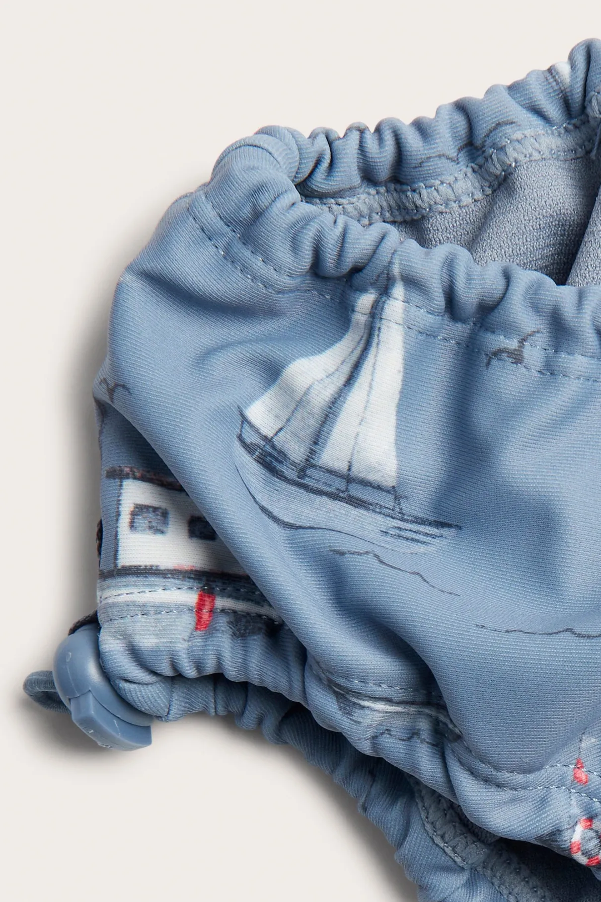 Baby & kids blue swim bottoms with boat motif