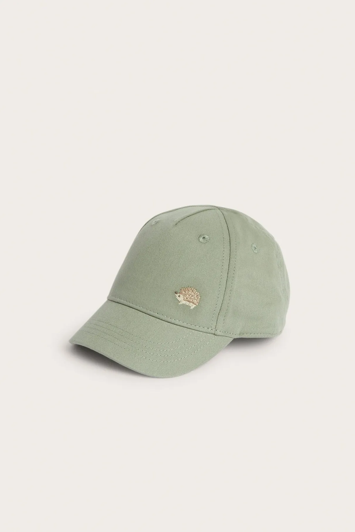 Baby & kids’ green cap with hedgehog embroidery