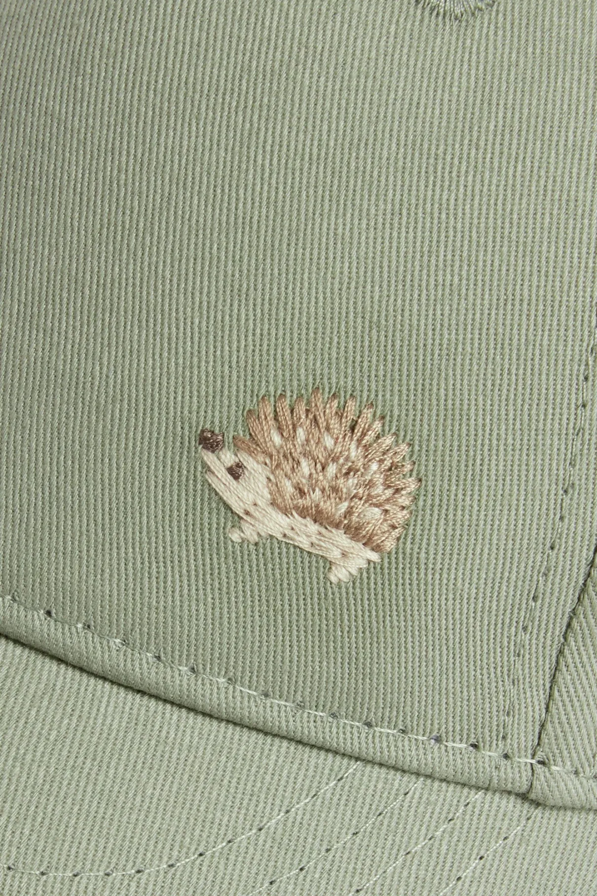 Baby & kids’ green cap with hedgehog embroidery