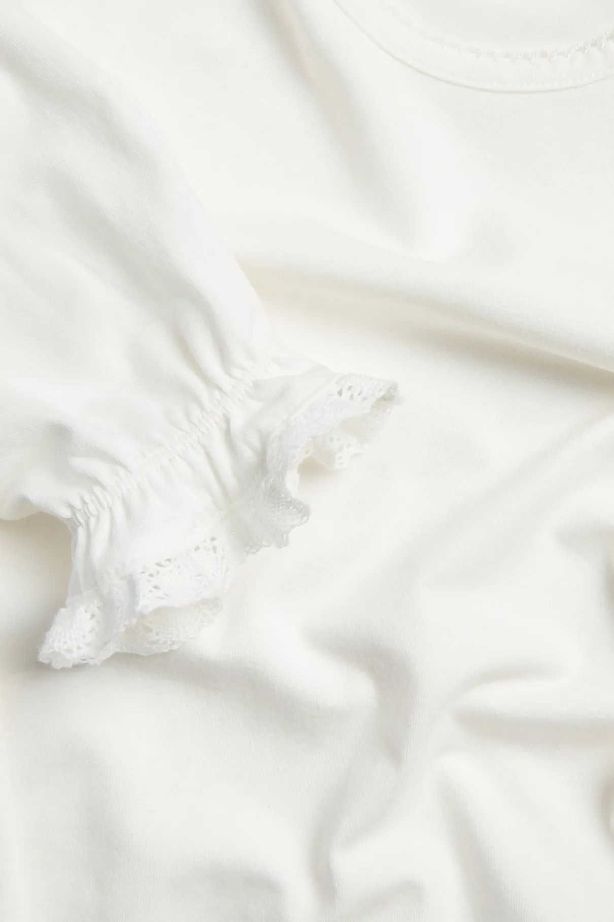 Baby & kids' white top with lace trim