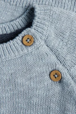 Baby knitted sweater with sailboats