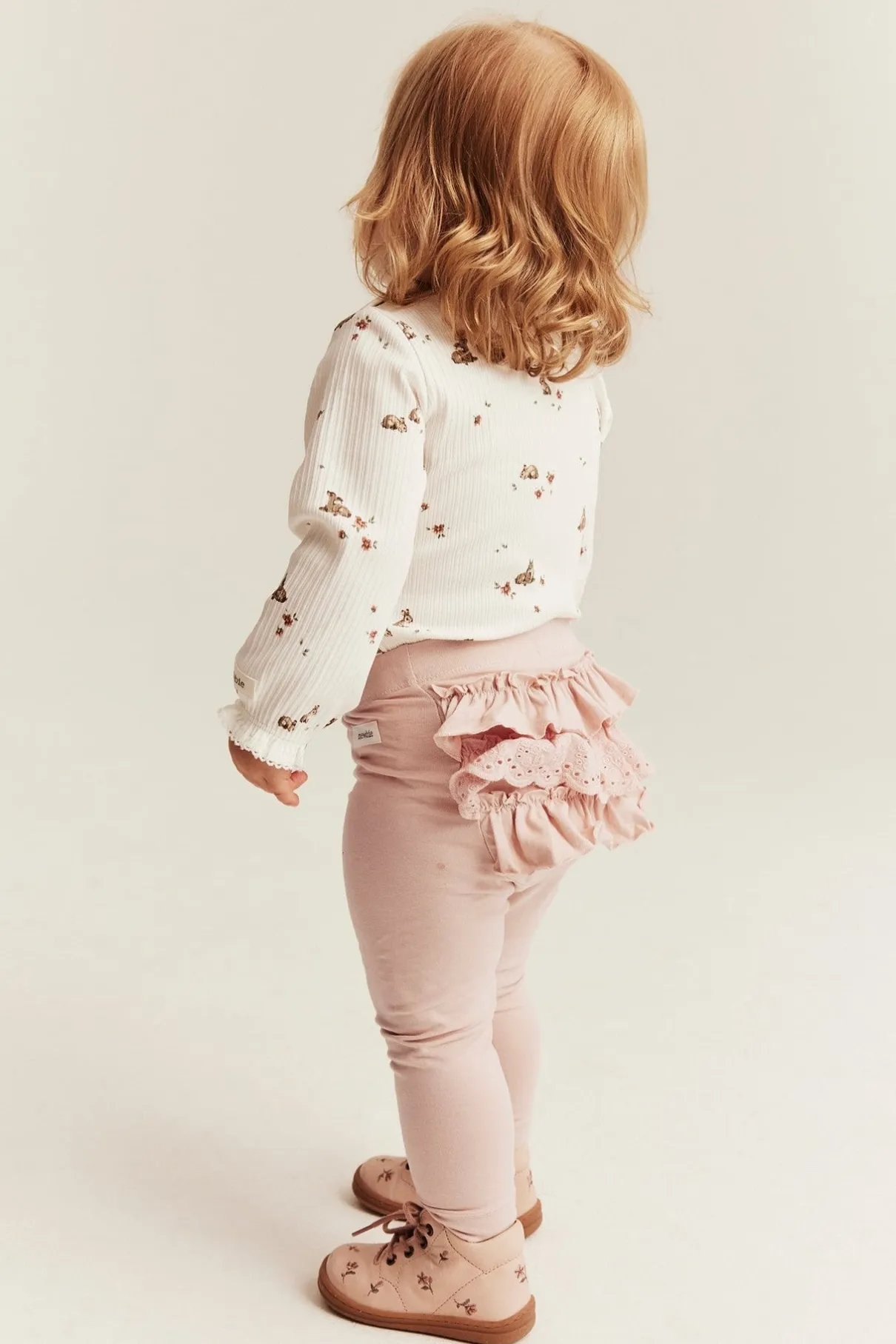 Baby light pink leggings with ruffles