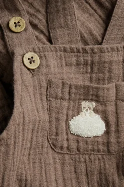 Baby muslin dungarees with teddy bear