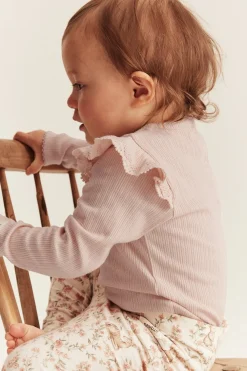 Baby pink bodysuit with ruffles