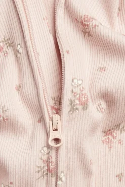 Baby pink floral sleepsuit with butterflies