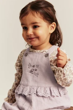 Baby purple dungarees with lace frill