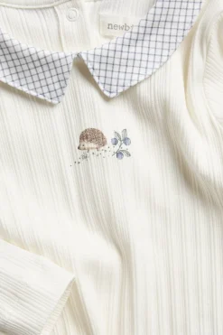 Baby white bodysuit with hedgehog print