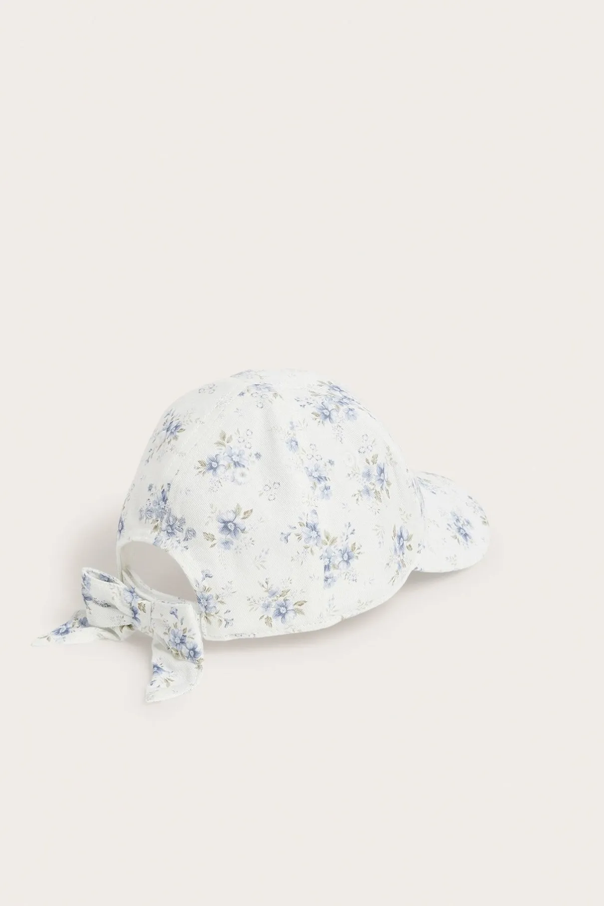 Baby white floral cap with bow