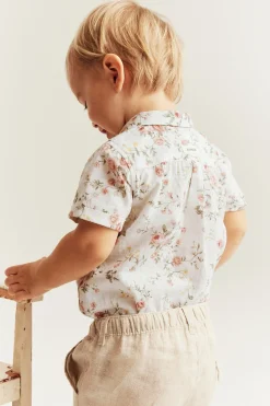Baby white floral short-sleeve bodysuit