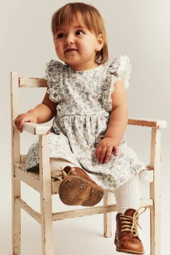Baby white floral sleeveless dress with lace