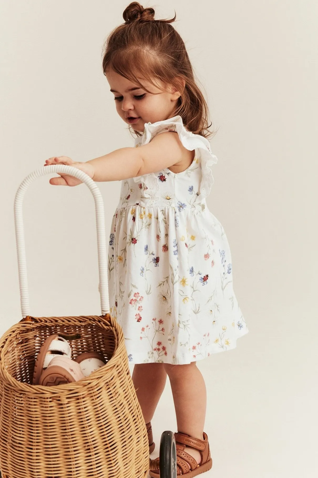 Baby white jersey dress with frill