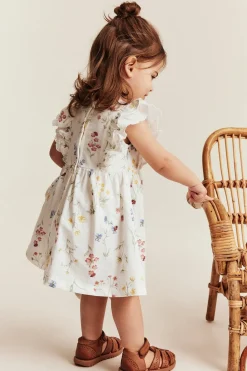 Baby white jersey dress with frill