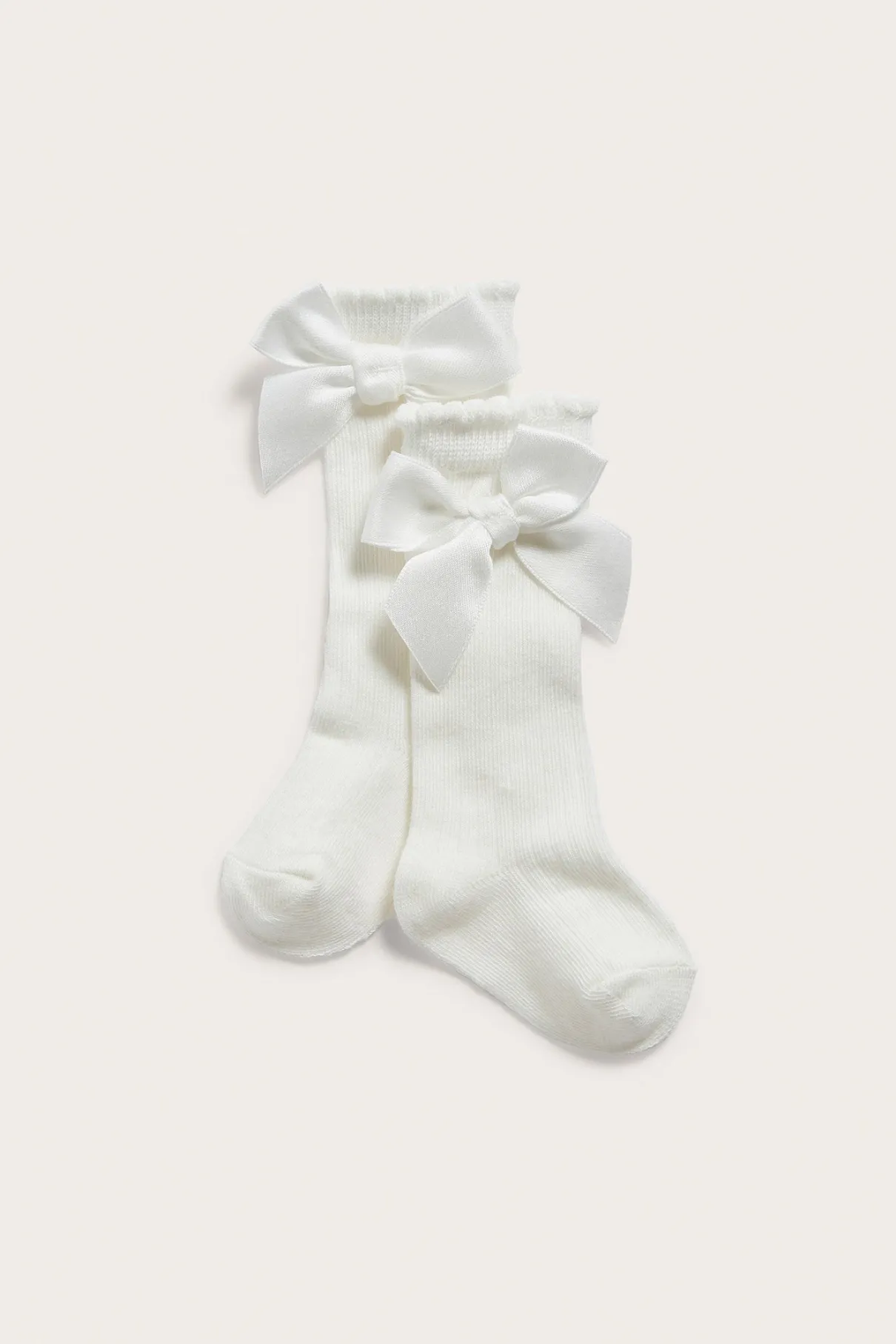 Baby white knee-high bow socks