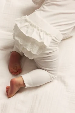 Baby white leggings with ruffles