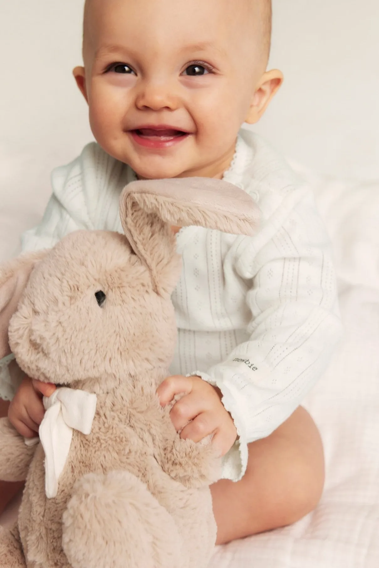 Baby white pointelle bodysuit