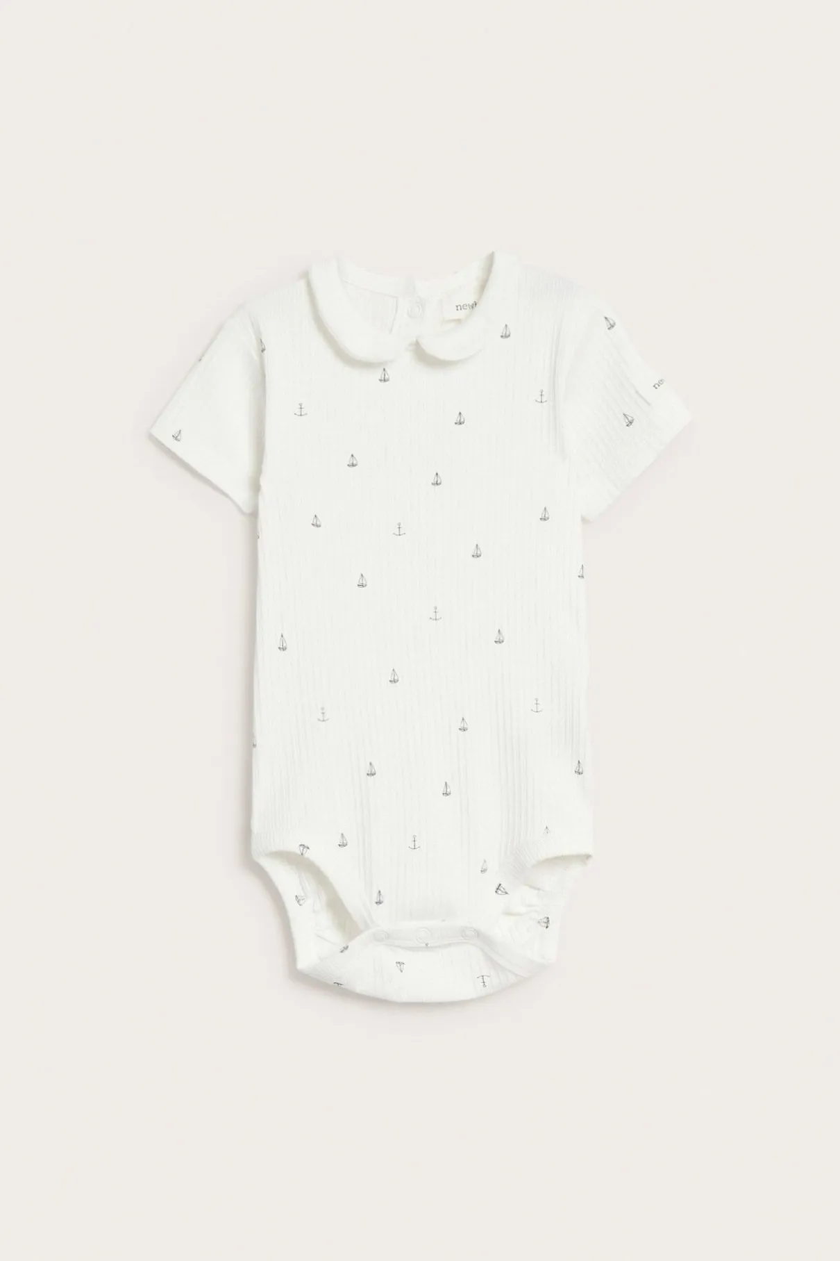 Baby white ribbed bodysuit with sailboats