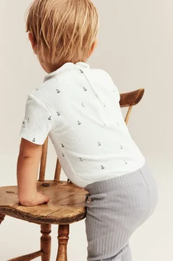 Baby white ribbed bodysuit with sailboats
