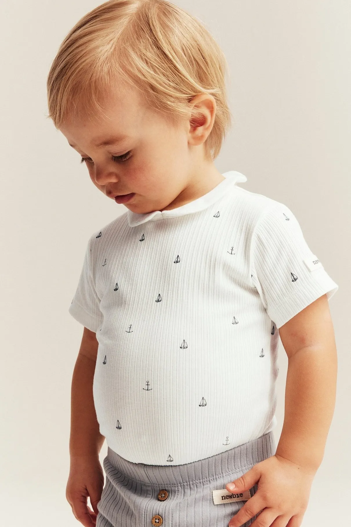 Baby white ribbed bodysuit with sailboats
