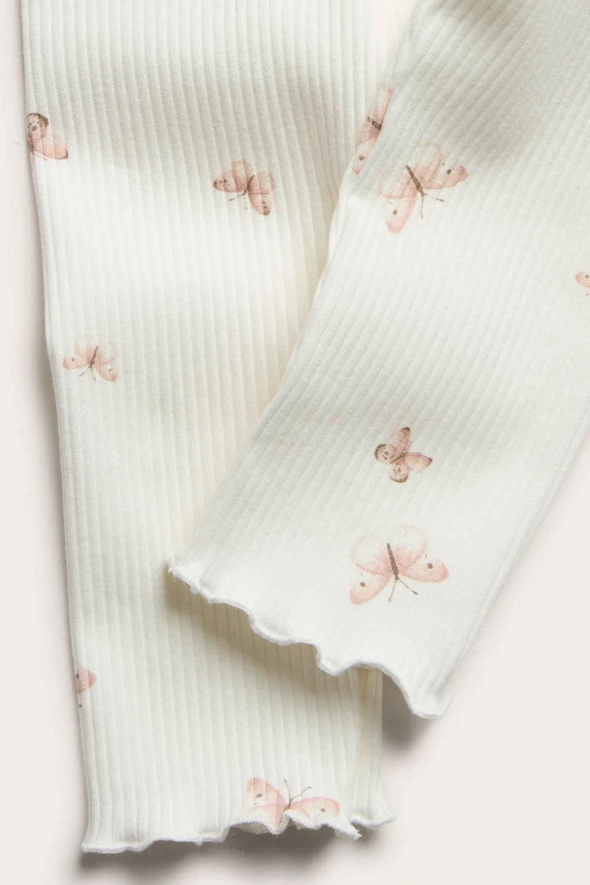 Baby white ribbed leggings with butterfly print