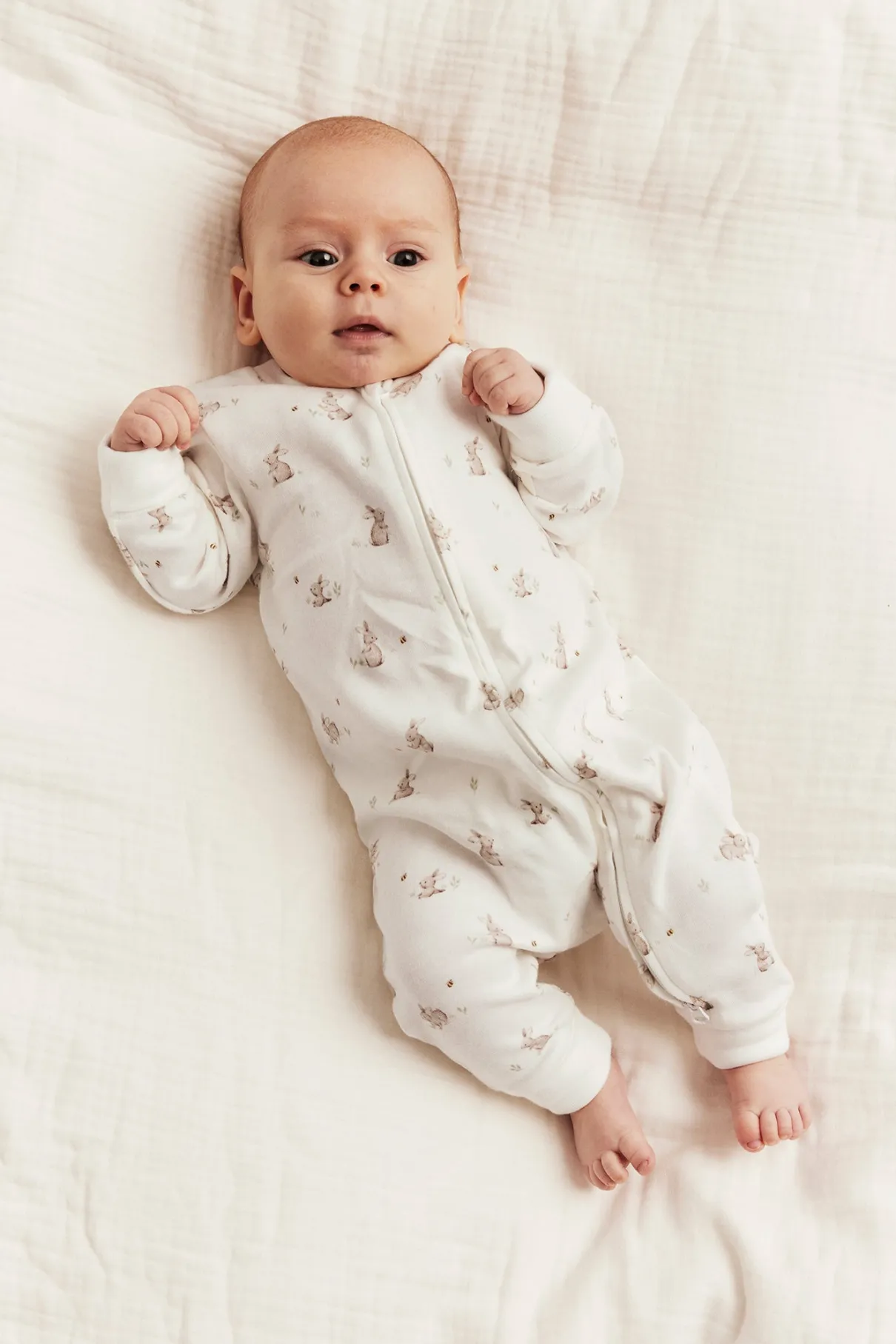 Baby white sleepsuit with bunny print
