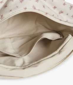 Beige floral print toiletry bag