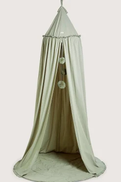 Green reading tent with pom-poms