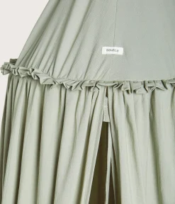 Green reading tent with pom-poms