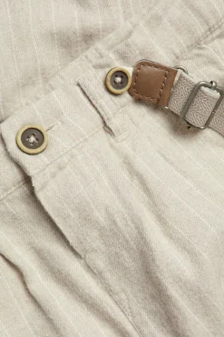Kids' beige trousers with suspenders